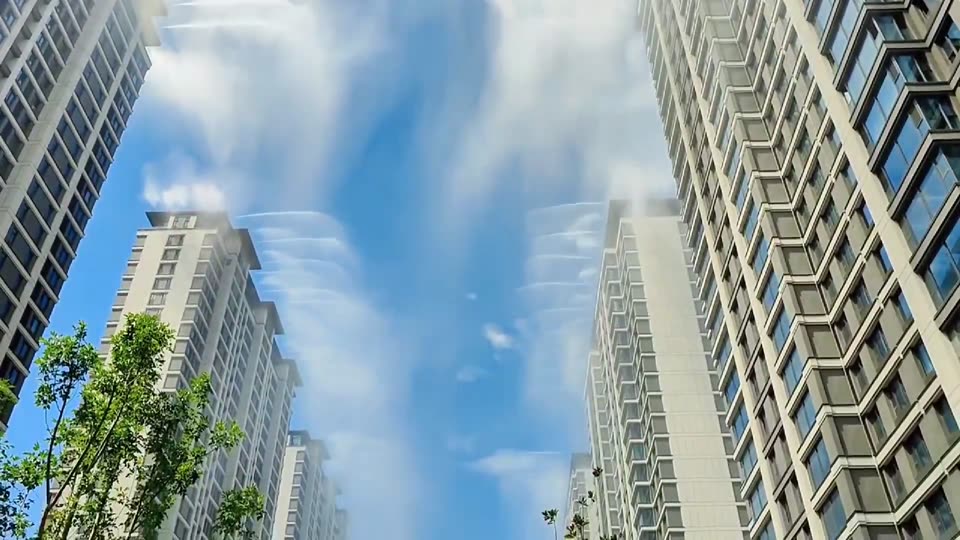 Rain cools the high-rises.